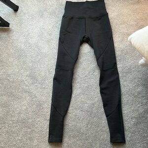 Gray Alphalete leggings. One of the original styles.